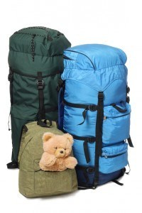 Two big backpacks and children's bag with toy