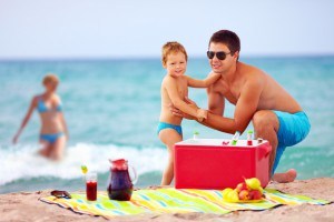 happy family on summer beach picnic